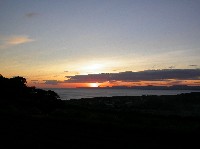 開聞岳周辺より望む南方に沈む夕日の写真